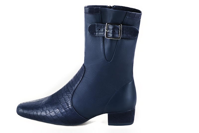 Navy blue women's ankle boots with buckles on the sides. Round toe. Low block heels. Profile view - Florence KOOIJMAN